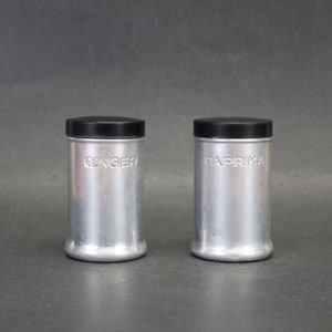 Vintage Aluminum Ginger and Paprika Spice Shakers with Black Lids Set of Two (E12235)