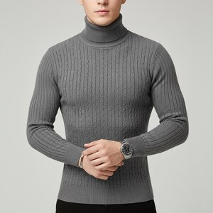 May include: A gray turtleneck sweater with a cable knit design. The long-sleeved sweater has a ribbed collar and cuffs. The person is wearing a watch and a bracelet. The sweater is a solid color and is made of a soft material.