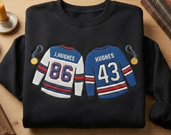 BESTICKTES Jack Hugos Quinn HUGOS Jersey-Sweatshirt, USA Gold Medal Hockey-Champions Rundhalsausschnitt, Hugos Brothers Hockey-Fan-Sweatshirt