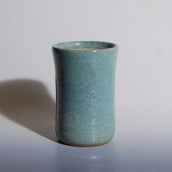 Utensil holder with blue green glaze