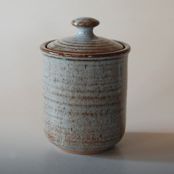 Canister, lidded jar with blue brown glazes