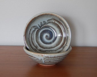 Pair of spiral bowls