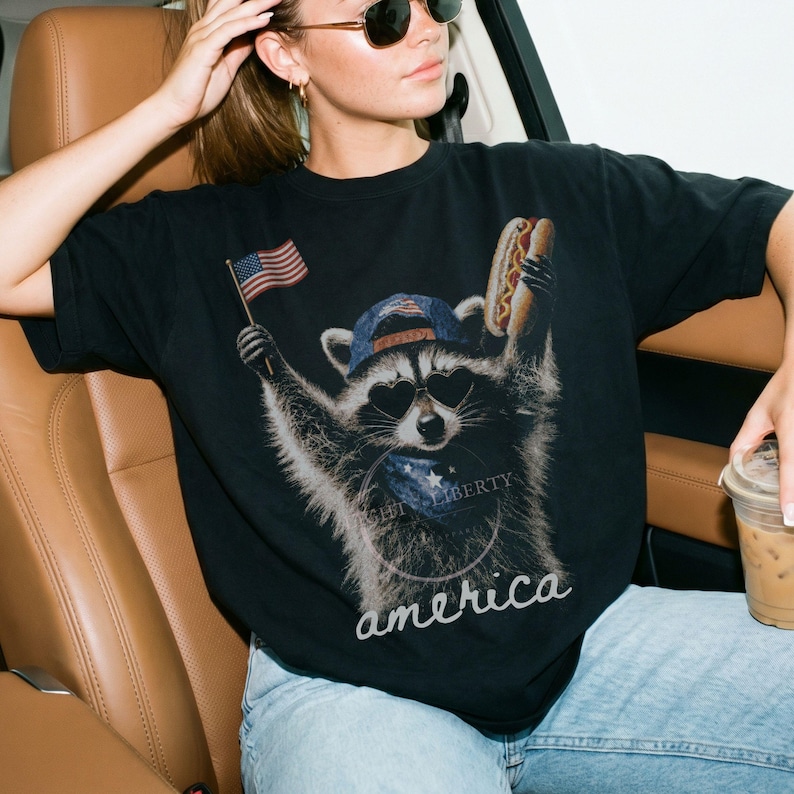 Patriotic Raccoon Hotdog T-Shirt Comfort Colors Funny Meme USA America 4th of July Tee American Flag Independence Day Humor Unisex Shirt Black