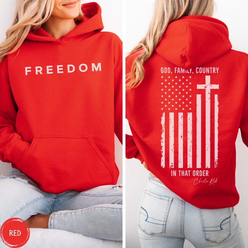 May include: Red hoodie with the word "FREEDOM" printed in white on the front. The back of the hoodie features a white graphic of the American flag with a cross and the text "GOD, FAMILY, COUNTRY IN THAT ORDER".