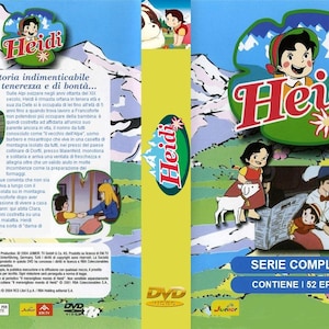 Può includere: Custodia DVD della serie animata "Heidi". La copertina presenta una bambina dei cartoni animati con un vestito rosso e una capra bianca, sullo sfondo di montagne e campi verdi. Il titolo "Heidi" è rosso.
