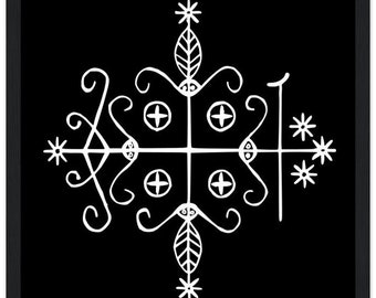 May include: Black framed art print featuring a white, symmetrical design with cross-like elements, circles, and starbursts. The artwork has a minimalist style and is suitable for home decor.