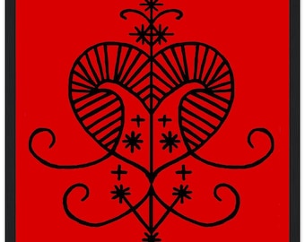 May include: A framed artwork featuring a black, symmetrical design on a vibrant red background. The central motif resembles a stylized heart with radiating lines and star-like elements, framed in a black border. The artwork is a bold statement piece.