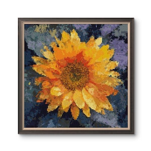 May include: A framed cross-stitch art piece featuring a vibrant yellow sunflower. The sunflower's petals are detailed with varying shades of yellow and orange, with a dark brown center. The background is a mosaic of dark blue and purple. The frame is a dark brown color.