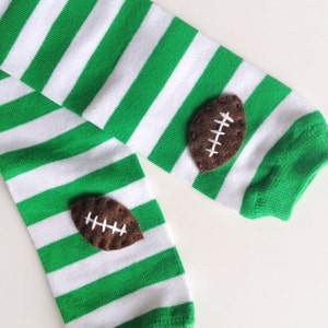 Football Baby Leg Warmers: green and white stripes with footballs Snack Size Leg Candy image 1
