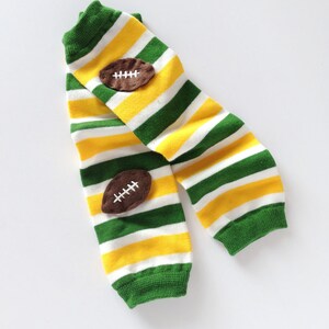 Snack Size Leg Candy Football Baby Leg Warmers: green, yellow, white stripes with footballs image 2