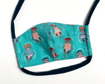 Otter Face Mask With Pocket for filter and fabric ties, Teal Otters face mask