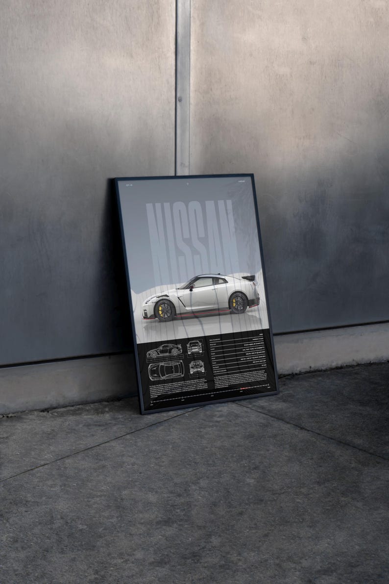 May include: A framed poster featuring a white Nissan sports car with yellow brake calipers. The word "NISSAN" is displayed in large, stylized letters. Below the car are technical drawings and text.