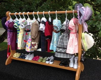 Stained Doll clothes bar to hold 18-in doll clothes. Doll closet. Shipping is included in the price.