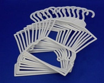 Ten great white plastic hangers for 18” doll clothes. Outfit hangers.