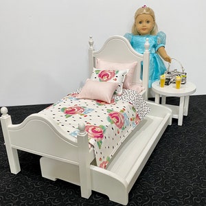 Doll furniture, 18-inch Doll furniture: a white bed with pink and white bedding. Shipping is included in the price. bed trundle table