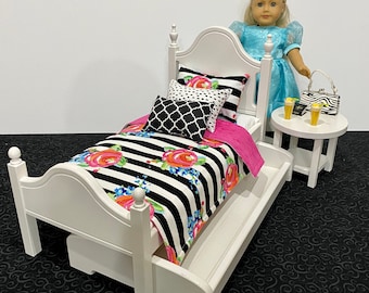 Doll bed for 18" doll with pink and black bedding. Shipping is included in the price.