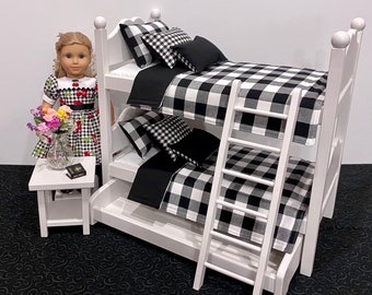 Doll bunk beds for 18 in dolls with black and white bedding. Shipping is included in the price.