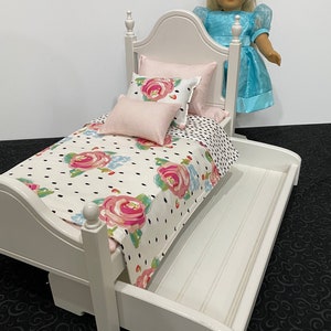 Doll furniture, 18-inch Doll furniture: a white bed with pink and white bedding. Shipping is included in the price. bed and trundle