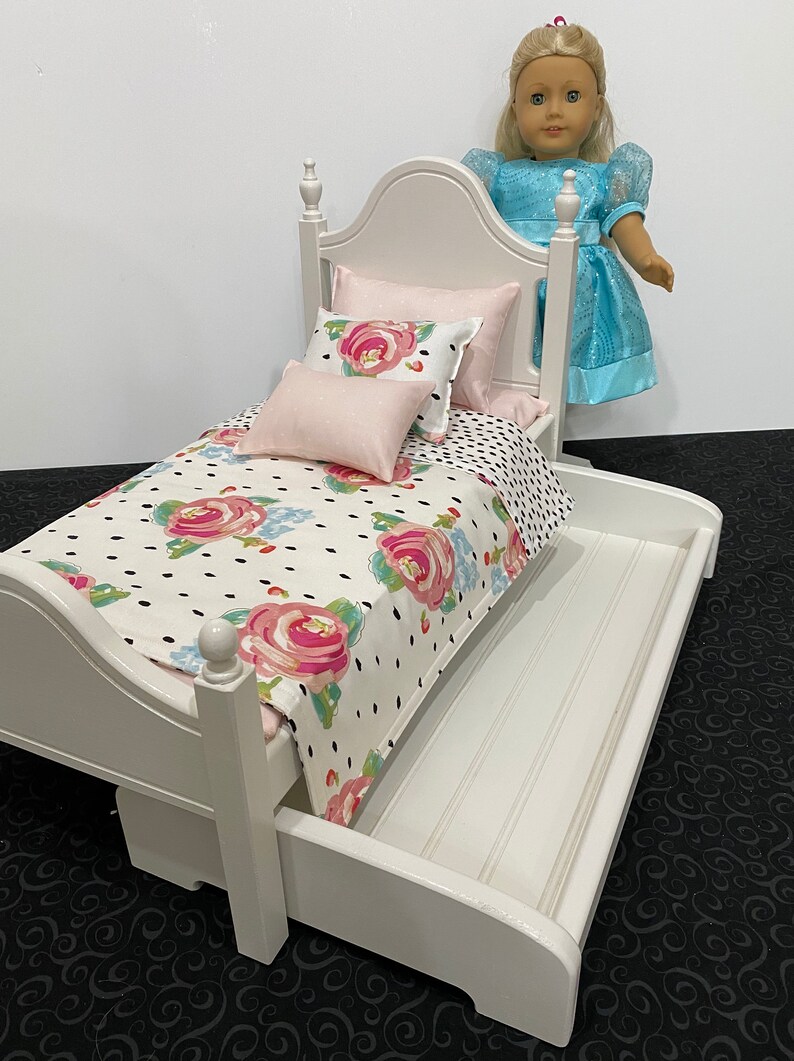 Doll furniture, 18-inch Doll furniture: a white bed with pink and white bedding. Shipping is included in the price. bed and trundle