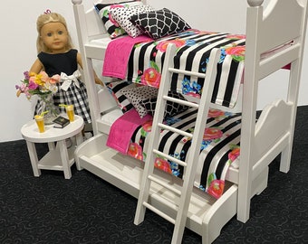 Doll bunk beds, for 18-inch doll, with black stripe, pink and white bedding. Shipping is included in the price.