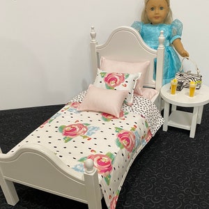 Doll furniture, 18-inch Doll furniture: a white bed with pink and white bedding. Shipping is included in the price. Bed plus end table