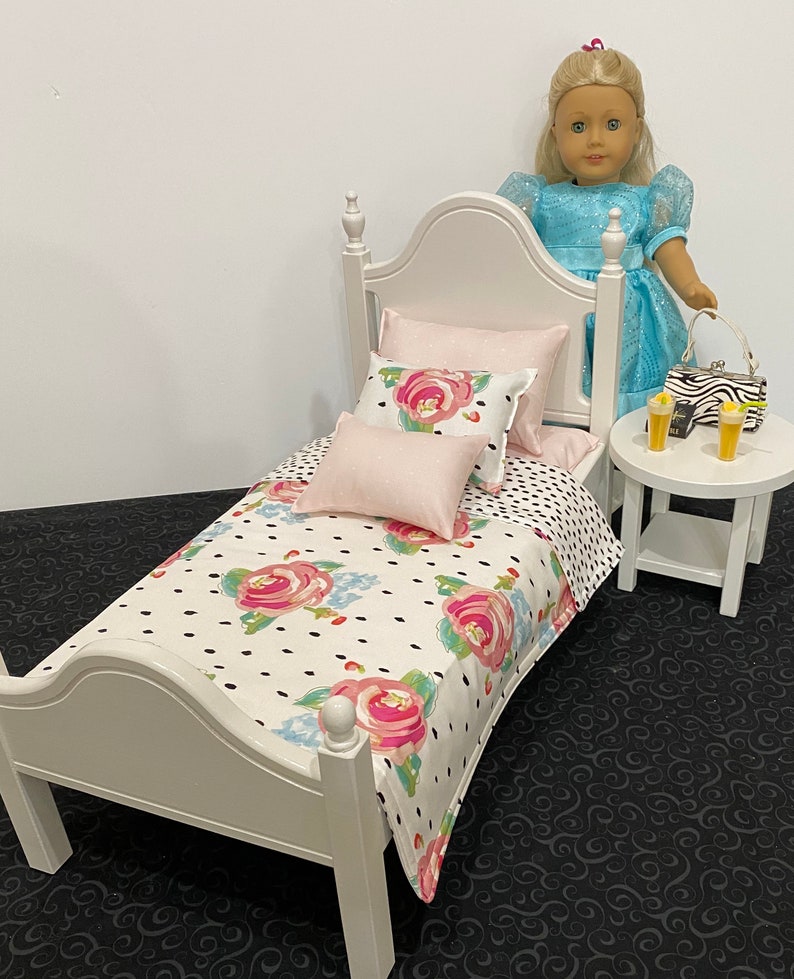 Doll furniture, 18-inch Doll furniture: a white bed with pink and white bedding. Shipping is included in the price. Bed plus end table