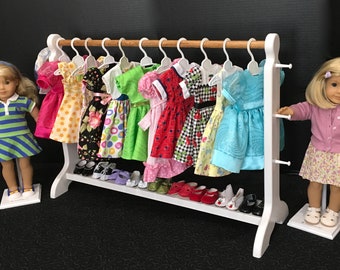 White 30-inch clothes rack for 18" dolls.  Shipping is included in the price.