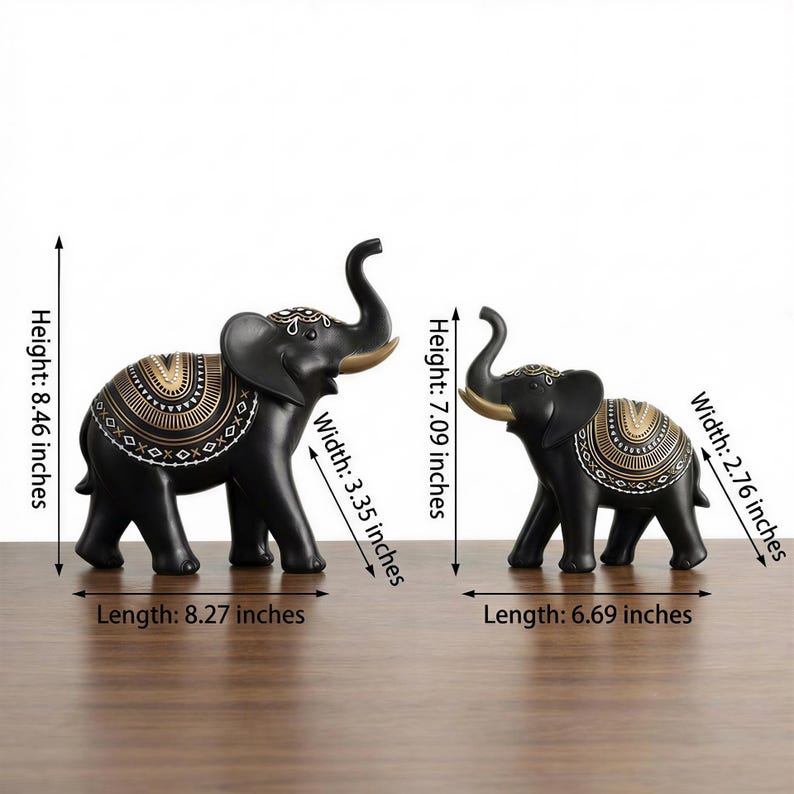 May include: Two black elephant figurines with gold and white decorative patterns. The larger elephant is 8.46 inches tall, 8.27 inches long, and 3.35 inches wide. The smaller elephant is 7.09 inches tall, 6.69 inches long, and 2.76 inches wide. These decorative statues are ideal for home decor.