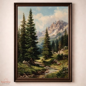 May include: A framed landscape painting shows a mountain scene with tall evergreen trees, a flowing stream, and distant mountains under a cloudy sky. The artwork is in a dark brown wooden frame. The painting has a vintage aesthetic.