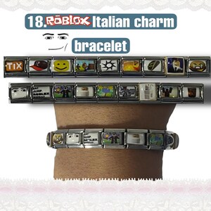 May include: An Italian charm bracelet with multiple rectangular charms. The charms feature various images and the text "TIX", "EAT SLEEP ROBLOX REPEAT", and "18. ROBLOX Italian charm bracelet" is displayed above the bracelet.