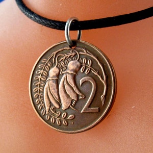 New Zealand necklace.  New Zealand charm. New Zealand flower jewelry. gardener gift. New Zealand coin .flower coin.kowhai flower No.001061