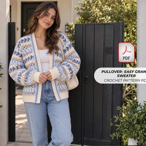 May include: A crochet cardigan featuring a granny square pattern in shades of light blue, cream, and dark blue. The garment has a cream-colored ribbed trim along the front opening and cuffs. Text on the image reads: PULLOVER- EASY GRANNY SWEATER CROCHET PATTERN PDF.
