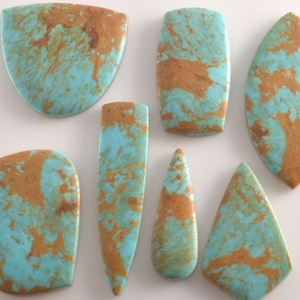 Turquoise Kingman Cabs- Golden Matrix (Stabilized) Multiple stone list