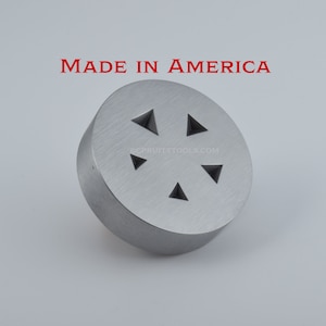 May include: A silver metal die with five triangular cutouts. The die is made in the USA and has the text "CPRUITTTOOLS.COM" on the side.