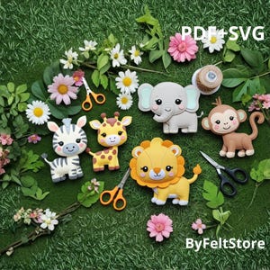 May include: A collection of felt animal figures, including a zebra, giraffe, elephant, monkey, and lion, arranged on a bed of green grass with flowers and scissors. The text "PDF + SVG" is visible.