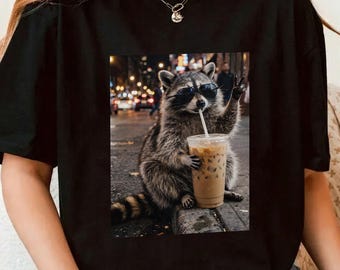 Raccoon Drinking Iced Coffee Png, Funny Animal Lover Meme Humor Tee, Retro Prehistoric Shirt Design Digital Download