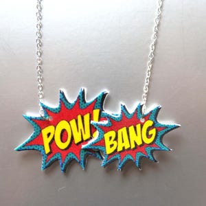 Comic Book Necklace Pow Boom Pendant: Cartoon Bubble Acrylic, Quirky Kitsch Jewelry, Fun Superhero Style.