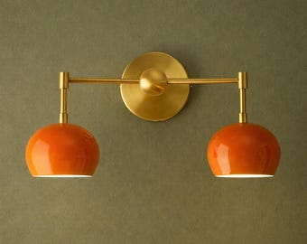 Handmade Mid-Century Modern Brass Wall Sconce: Orange Accent Light