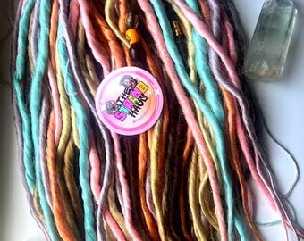Yarn falls hand-made pastel temp hair extensions Handmade pastel rainbow wavy dreads in Exmouth main image 3