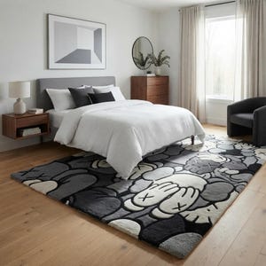 Luxury hand tufted New Zealand wool rug featuring a bold monochrome contemporary character-inspired design in black, white, and grey. Plush carved texture adds depth and softness while creating a modern artistic statement for living rooms, bedrooms, offices, and stylish interiors with premium handcrafted quality.