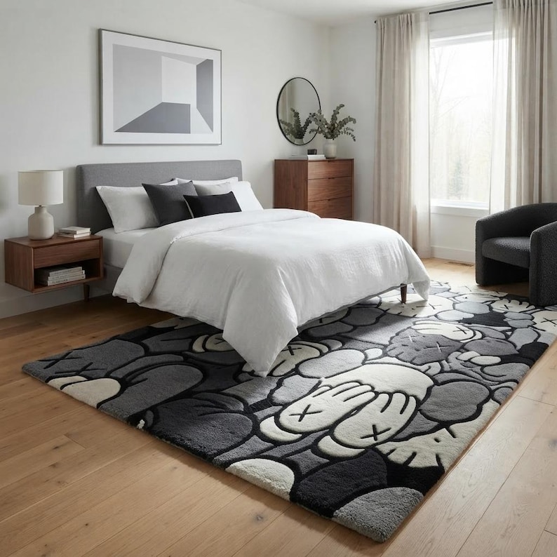 Luxury hand tufted New Zealand wool rug featuring a bold monochrome contemporary character-inspired design in black, white, and grey. Plush carved texture adds depth and softness while creating a modern artistic statement for living rooms, bedrooms, offices, and stylish interiors with premium handcrafted quality.