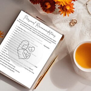 May include: A list of postpartum product recommendations on a white paper with the title "Personal Recommendations". The paper is on a wooden surface, with a gold pen, a cup of tea, and flowers. The list includes brands like Frida Mom and Earth Mama.
