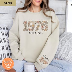 May include: A handmade wooden sign with the text "Welcome" in a playful font. The sign is painted white with a distressed finish, and features a small, decorative heart. Dimensions are approximately 12 inches wide and 6 inches tall.