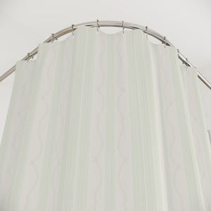 May include: A white shower curtain with vertical light green stripes and a subtle wavy pattern. The curtain hangs from a curved, silver-colored shower rod. The design is simple and clean, suitable for a bathroom.
