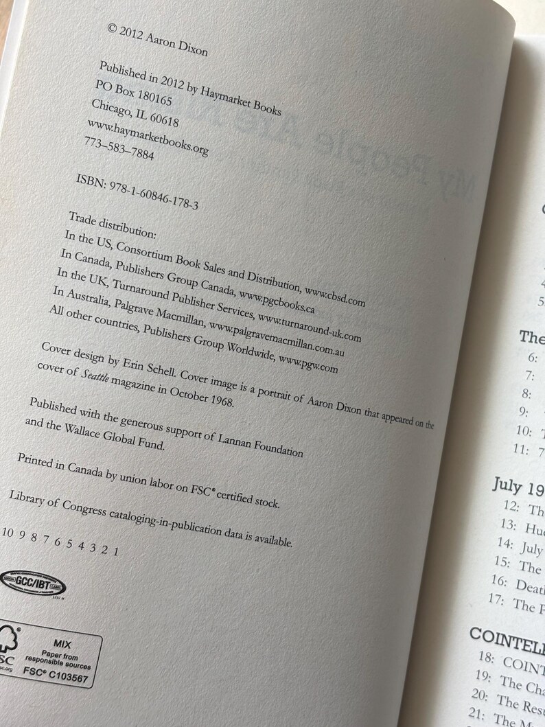 May include: Open book page with text including the publisher's information, ISBN, and trade distribution details. The text is in black font on a light-colored paper. The book was published in 2012.