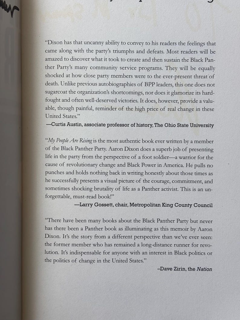 May include: A page from a book featuring text about the Black Panther Party. The text includes quotes from Curtis Austin, Larry Gossett, and Dave Zirin, discussing the book "My People Are Rising" by Aaron Dixon.