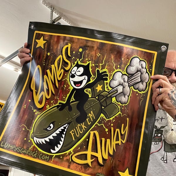Lumpy’s Garage, “bombs away” 24”x24” printed vinyl banner