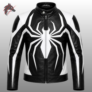 May include: A black and white leather jacket featuring a large white spider graphic on the front, a stand-up collar with a snap button, a full-length front zipper, and two zippered side pockets. The sleeves have white panels and black accents.