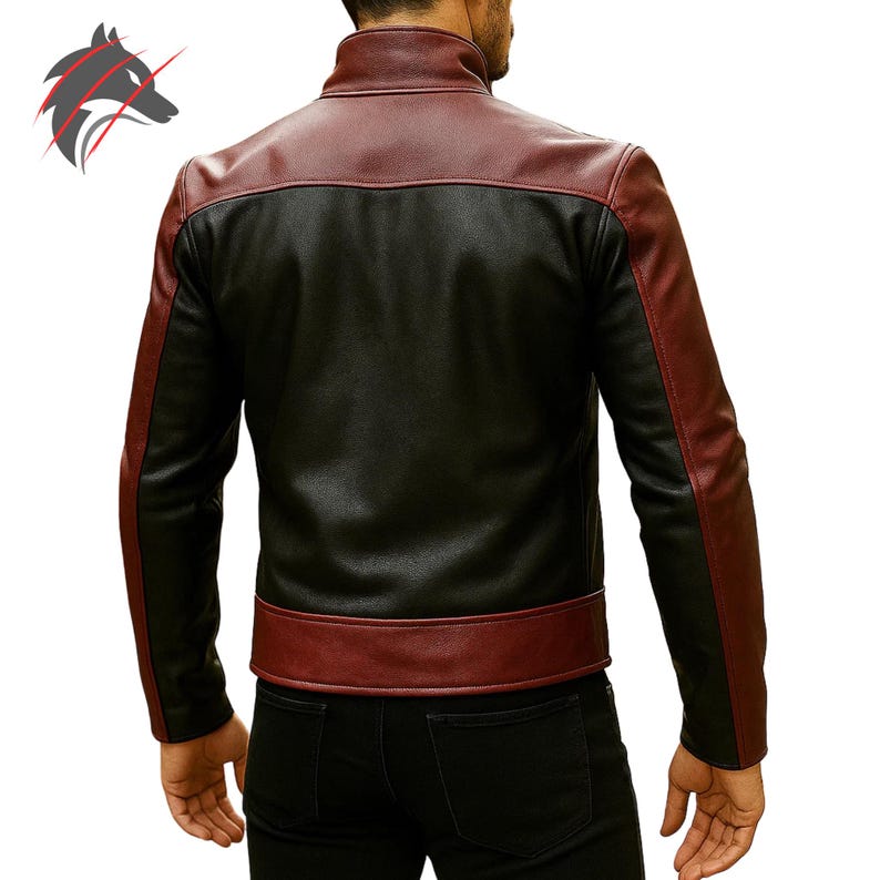 May include: Black and burgundy leather jacket with a stand-up collar. The jacket features burgundy accents on the shoulders, sleeves, and waist. The back view of the jacket is shown, highlighting the contrasting colors and design.