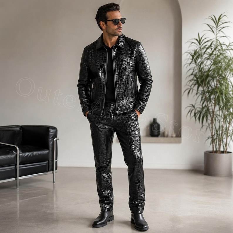 Man wearing a black crocodile embossed genuine leather jacket and matching leather pants, handmade luxury leather suit, designer style men's leather outfit, premium custom leather clothing.